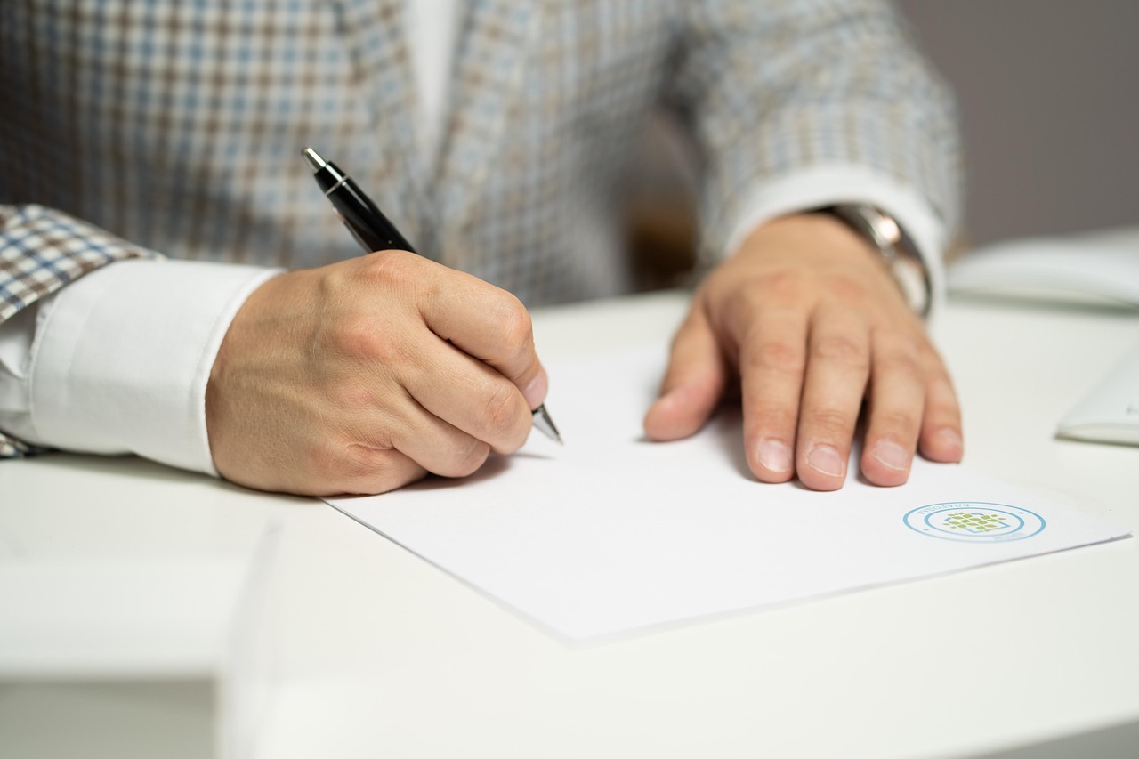 man signing document, how to get out of my timeshare